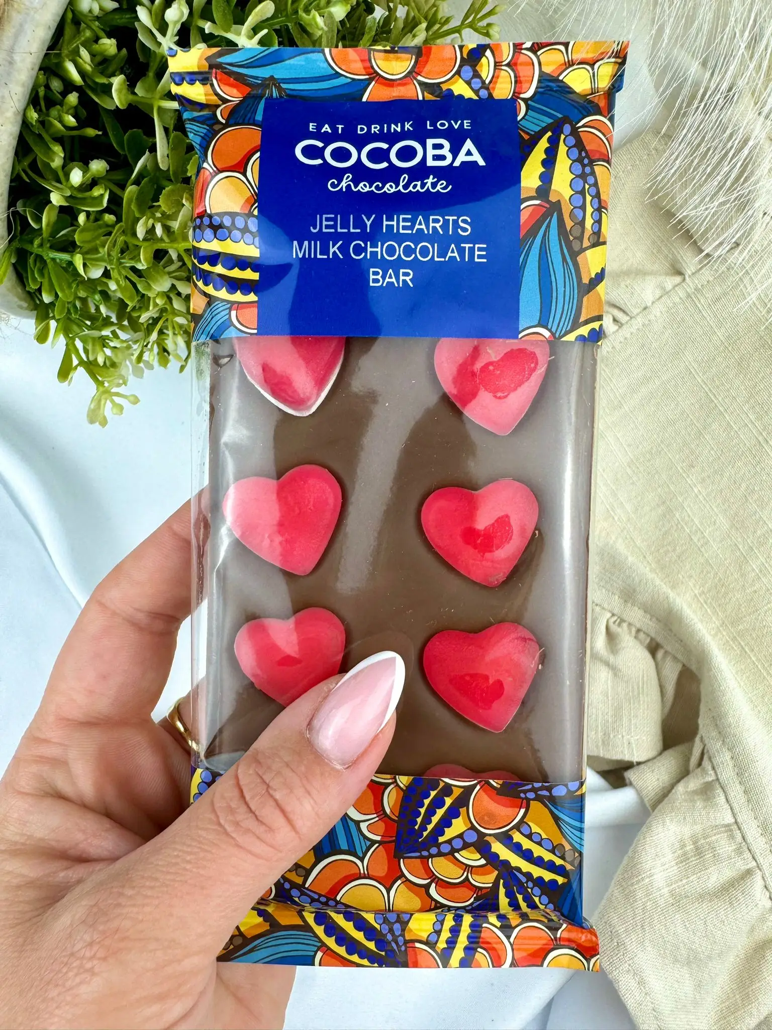 Cocoba Jelly Hearts Milk Chocolate Bar, handmade and topped lovingly with red jelly hearts. Contains a min of 35.1% cocoa solids - Image 1